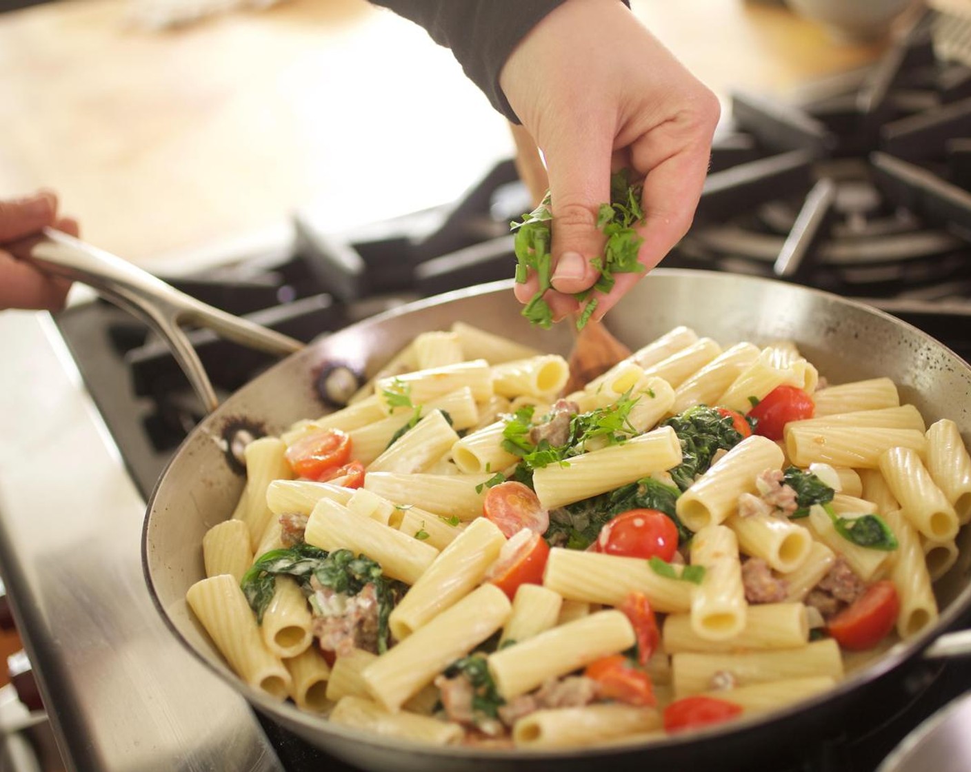 step 9 Add the pasta to the pan along with the reserved half cup of pasta water, Parmesan Cheese (2 Tbsp), half of the Goat Cheese (4 Tbsp), and Salt (1/2 tsp). Toss to combine. Add Fresh Parsley (3 Tbsp) and stir to combine. Remove from heat.