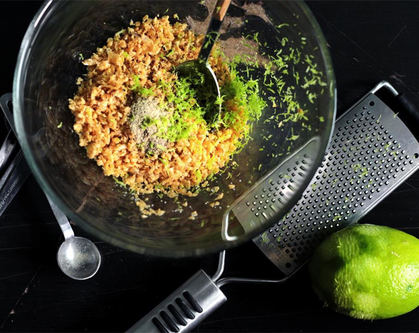 step 6 Mix half of the fried garlic with Ground White Pepper (3/4 tsp), Ground Black Pepper (1/4 tsp), and the zest of a Lime (1/2). Set aside.