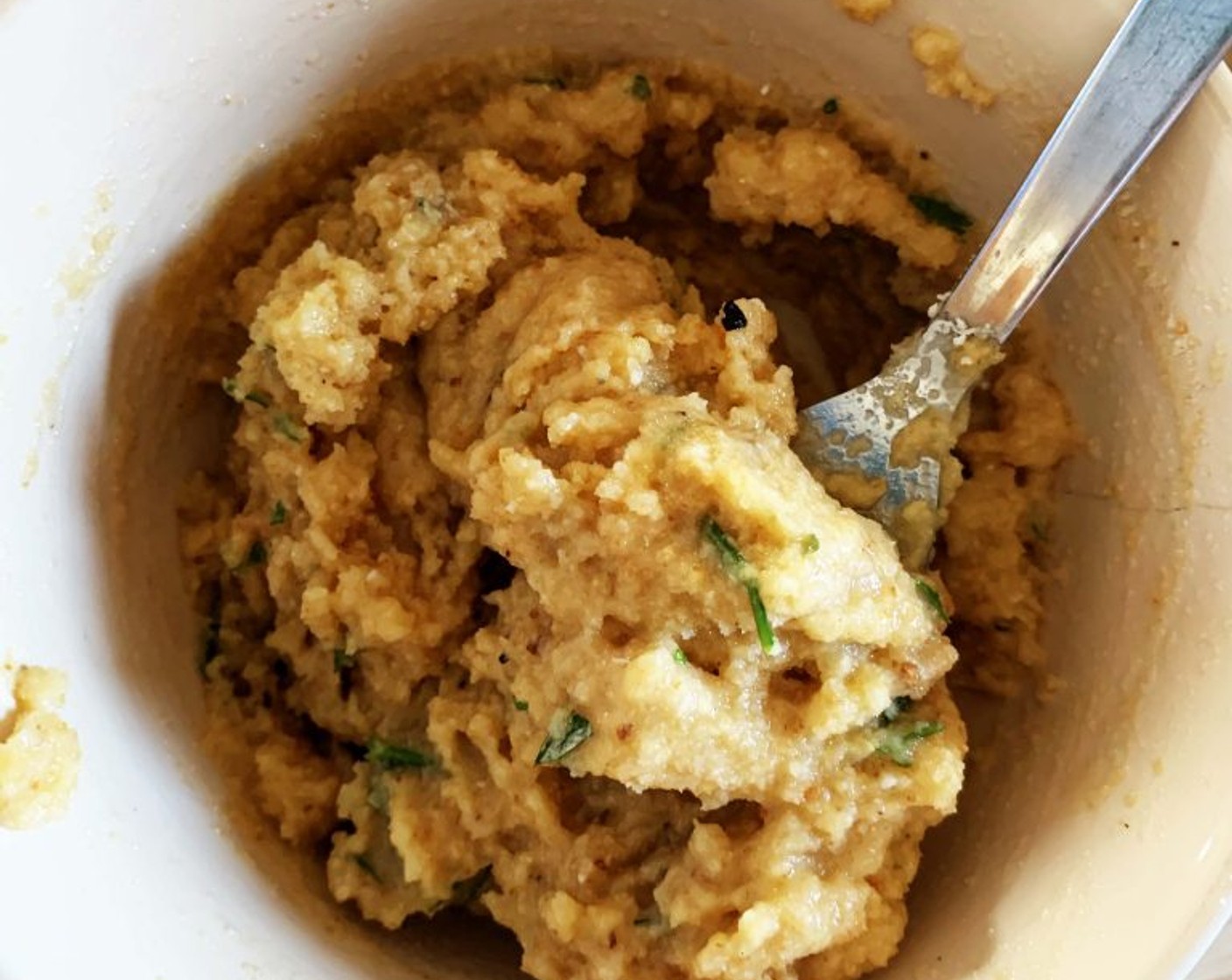 step 3 For the filling, in a large bowl place Eggs (6), half of the filtered water, 1 clove of mincedGarlic (1 clove), Fresh Parsley (1 Tbsp), Ground Black Pepper (to taste), Pecorino Romano Cheese (3 Tbsp), and Breadcrumbs (as needed). Mix all the ingredients together adding more breadcrumbs to get a wet but dense paste. If needed add some Salt (to taste). Set the mixture aside and wait for 10 minutes.