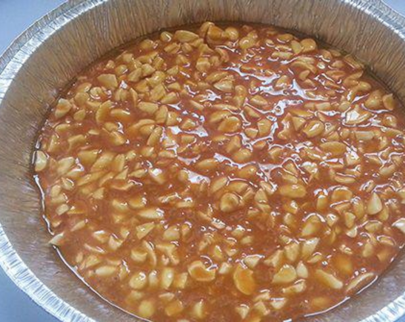 step 3 Now add the chopped Assorted Nuts (140 g) and combine.  I have used cashew nuts and almonds. Pour this to the prepared container and let it cool well.
