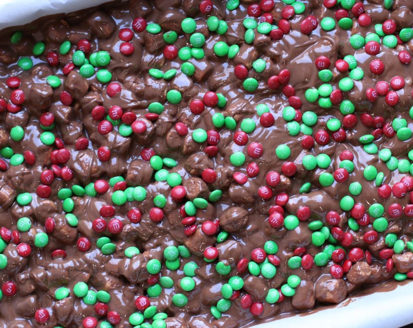 step 6 Sprinkle with M&M's® Milk Chocolate Minis (1 cup) and refrigerate until set.