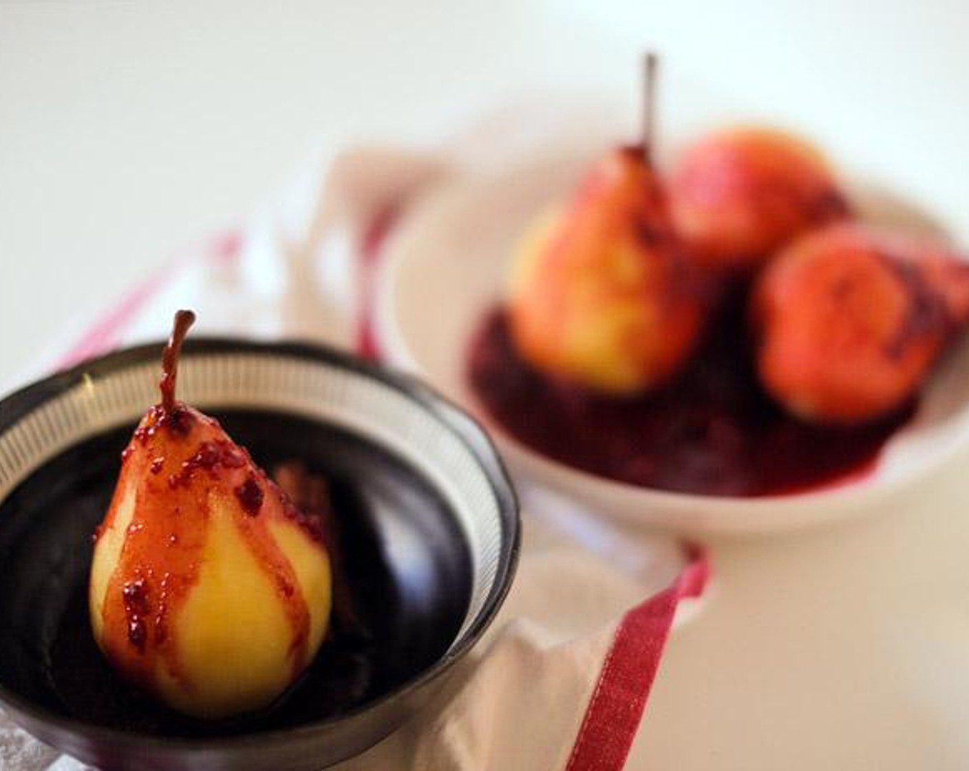 Poached Pears with Raspberry Chocolate Sauce