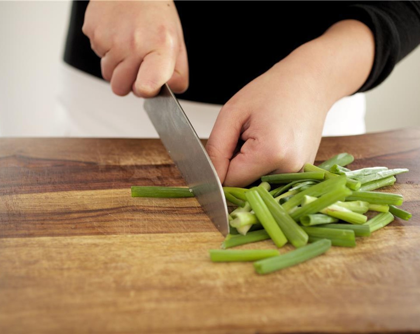 step 1 In a large saucepan, bring eight cups of water and Salt (1/2 Tbsp) to a boil. Cut the Scallion (1 bunch) two inch long pieces, and set aside. Smash the Garlic (2 cloves) and set aside. Cut the Pancetta (1 pckg) into quarter inch pieces and set aside.