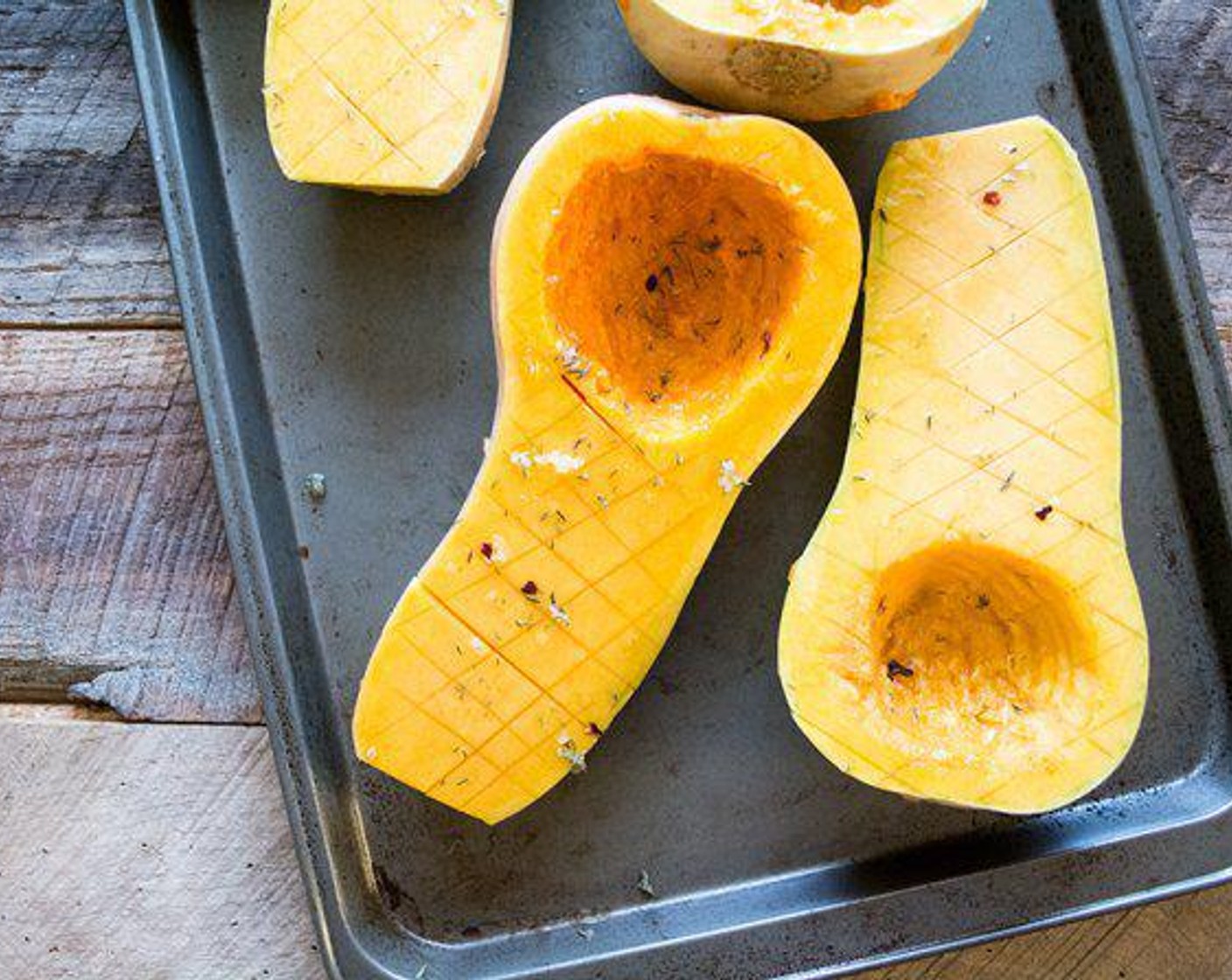 step 2 Cut criss-cross patterns over each Butternut Squash (2) half, careful not to cut the skin.