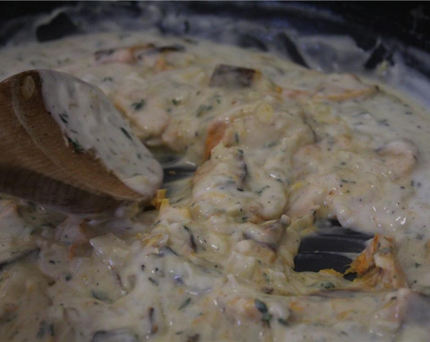 step 12 Add the roasted squash to the sauce, mashing with a potato masher, wooden spoon, or a fork until almost completely smooth.