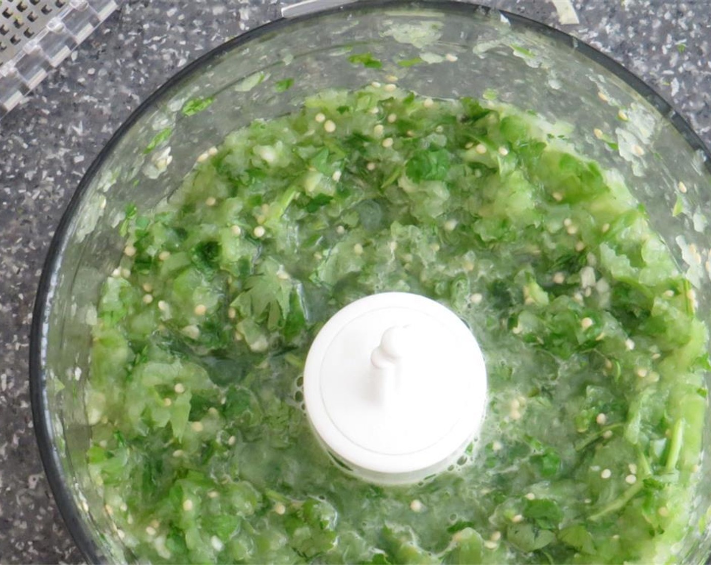 step 7 For salsa, add the tomatillo, jalapeno pepper, peeled Garlic (1 clove), and Fresh Cilantro (1/2 cup) to the bowl of a mini prep-food processor. Pulse 6-8 times until chunky salsa forms. Season with Salt (to taste) and Ground Black Pepper (to taste).