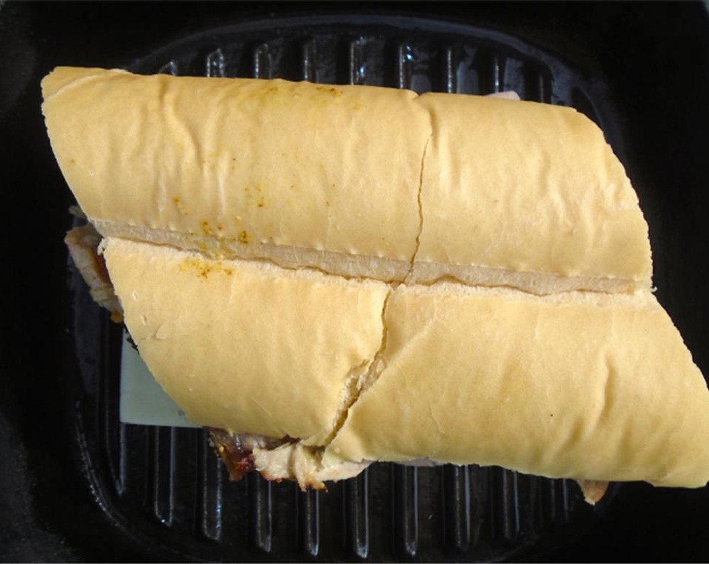 step 8 Close the sandwich, Butter (3 Tbsp) both sides of the bread, and place on a griddle or sandwich press.