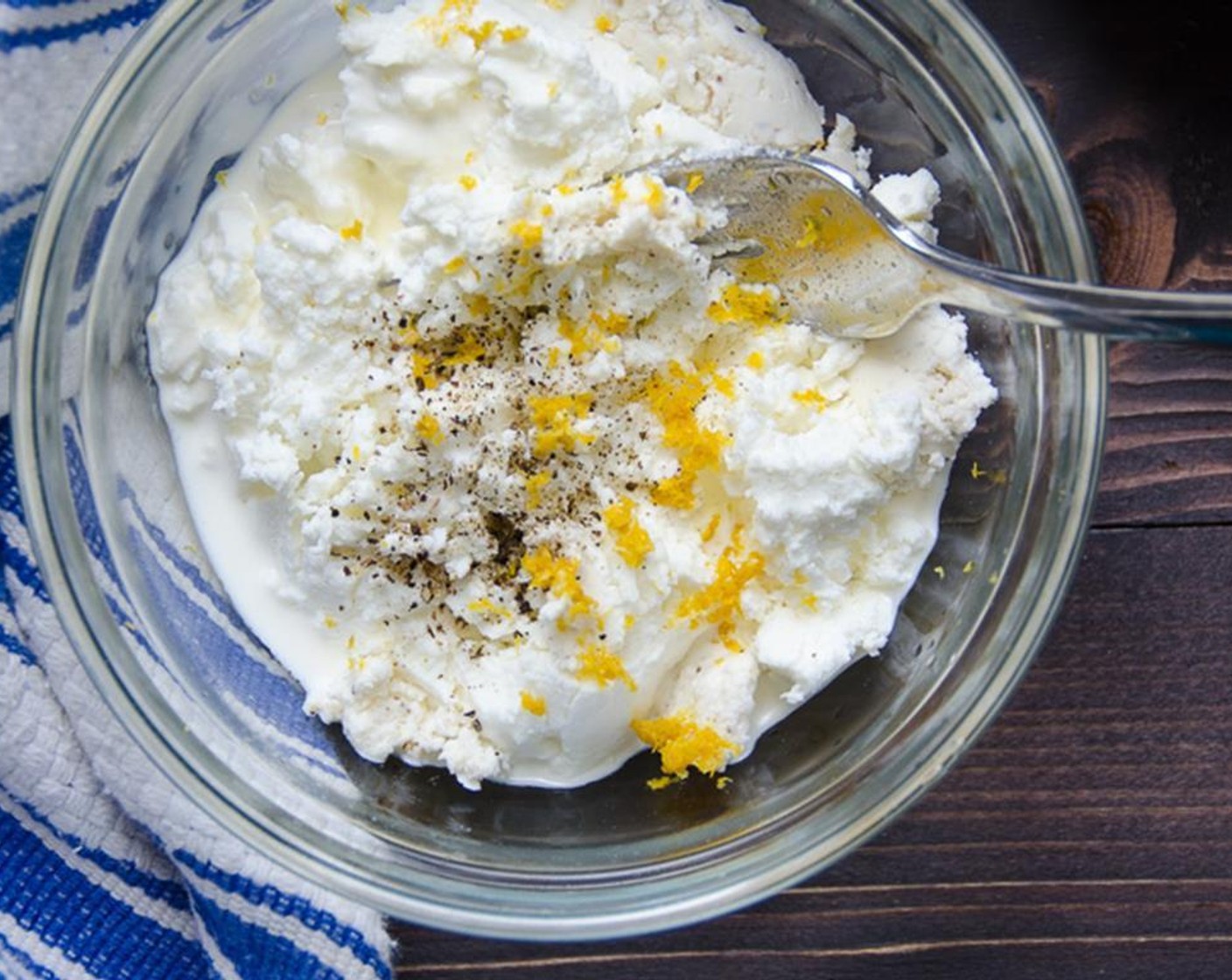 step 1 In a small bowl combine the  Goat Cheese (1/2 cup) and the Cream (1/3 cup). Stir until smooth. Add Lemon (1) and Ground Black Pepper (1/4 tsp).  Stir to combine and set aside.