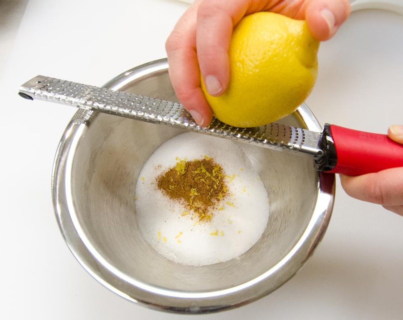step 10 In a bowl, add Granulated Sugar (1/2 cup), Salt (1/4 tsp), Ground Nutmeg (1/4 tsp), Simply Organic Cinnamon, Ground (1/4 tsp) and zest of a Lemon (1).