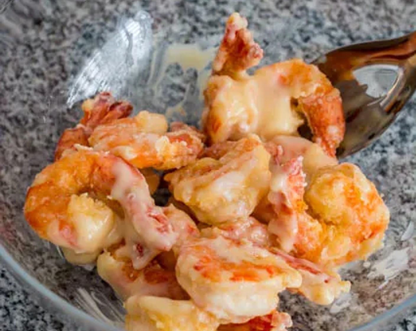 step 10 Transfer the shrimp to a large bowl, add the creamy honey sauce, and toss to combine.