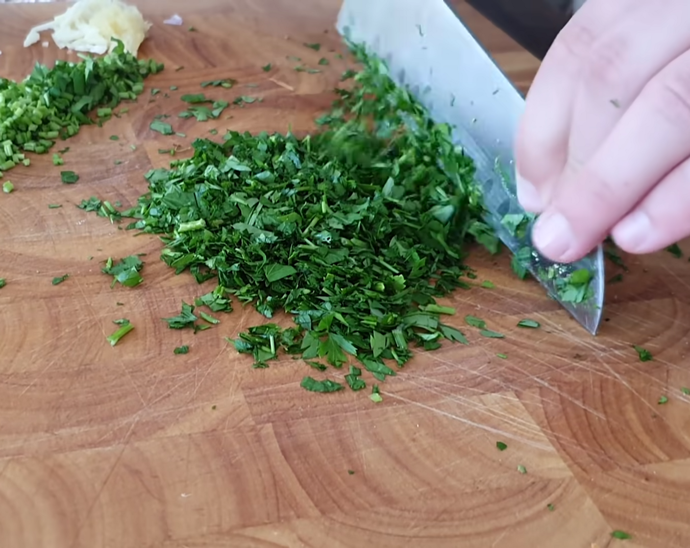 step 3 Now, chop up the Fresh Parsley (1 bunch) into small pieces, making sure to chop the stems finely too!