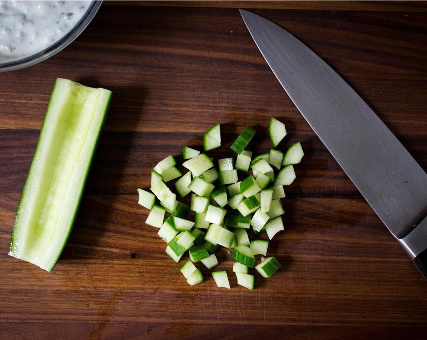 step 1 Deseed and dice the English Cucumbers (1 1/2 cups). Finely chop the Fresh Mint (2 Tbsp).