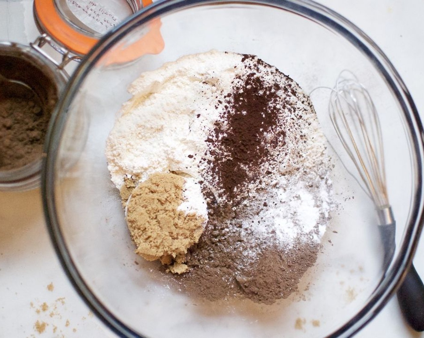 step 2 In a large bowl stir together All-Purpose Flour (1 3/4 cups), Brown Sugar (1/3 cup), Unsweetened Cocoa Powder (1/4 cup), Baking Powder (1/2 Tbsp), Instant Coffee (1 tsp), and Baking Soda (1/2 tsp). Make a well in the center of the flour mixture; set aside.