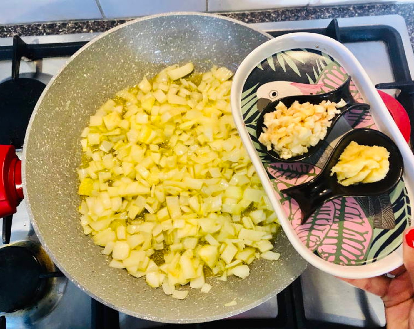 step 1 In a large-sized saucepan, heat the Olive Oil (1 Tbsp). Add the Yellow Onion (1) and saute a couple of minutes until softened.