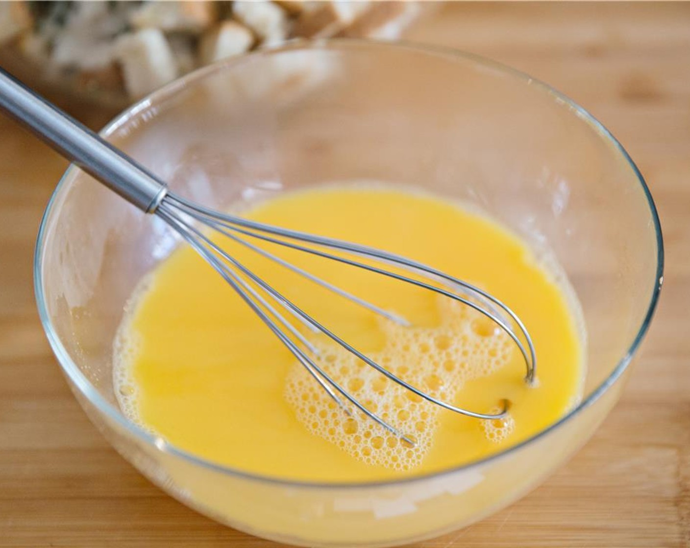 step 9 Whisk the Low-Sodium Chicken Stock (2 1/2 cups) and Eggs (2) until combined.