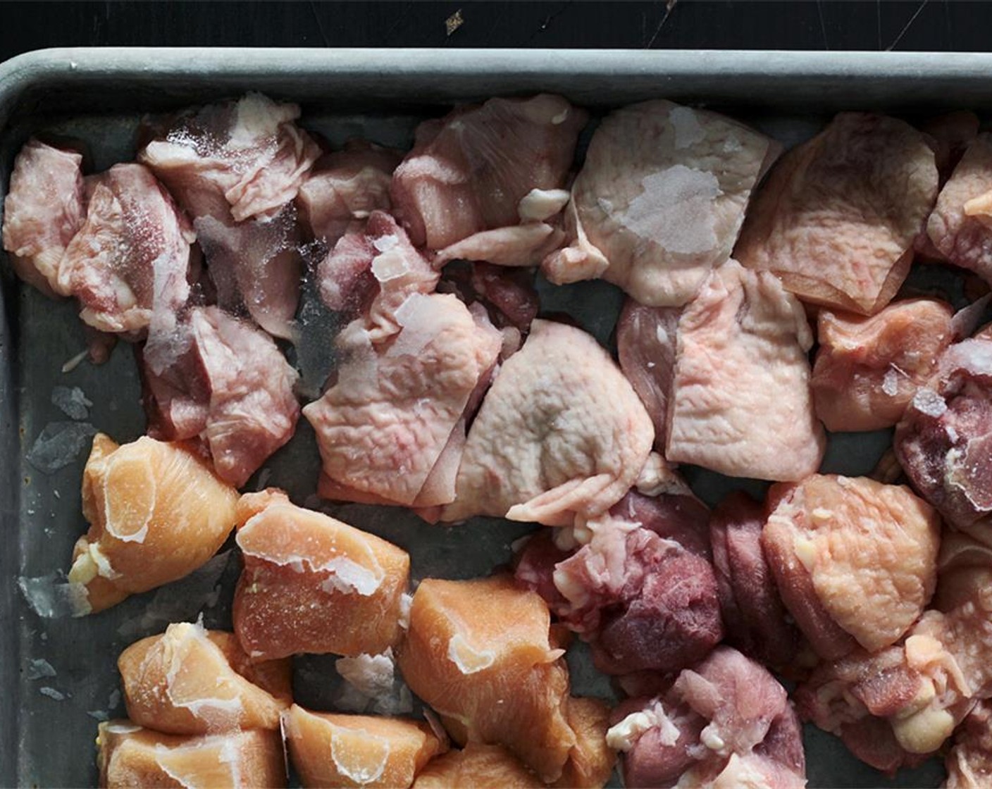 step 1 Cut the Skin-On Chicken Thighs (1.8 lb) and Skinless Chicken Breasts (10.5 oz) into chunks. Spread the skin-on chicken thighs and chicken breast on a sheet in a single layer. Flash-freeze for 2 hours until the skins completely harden.