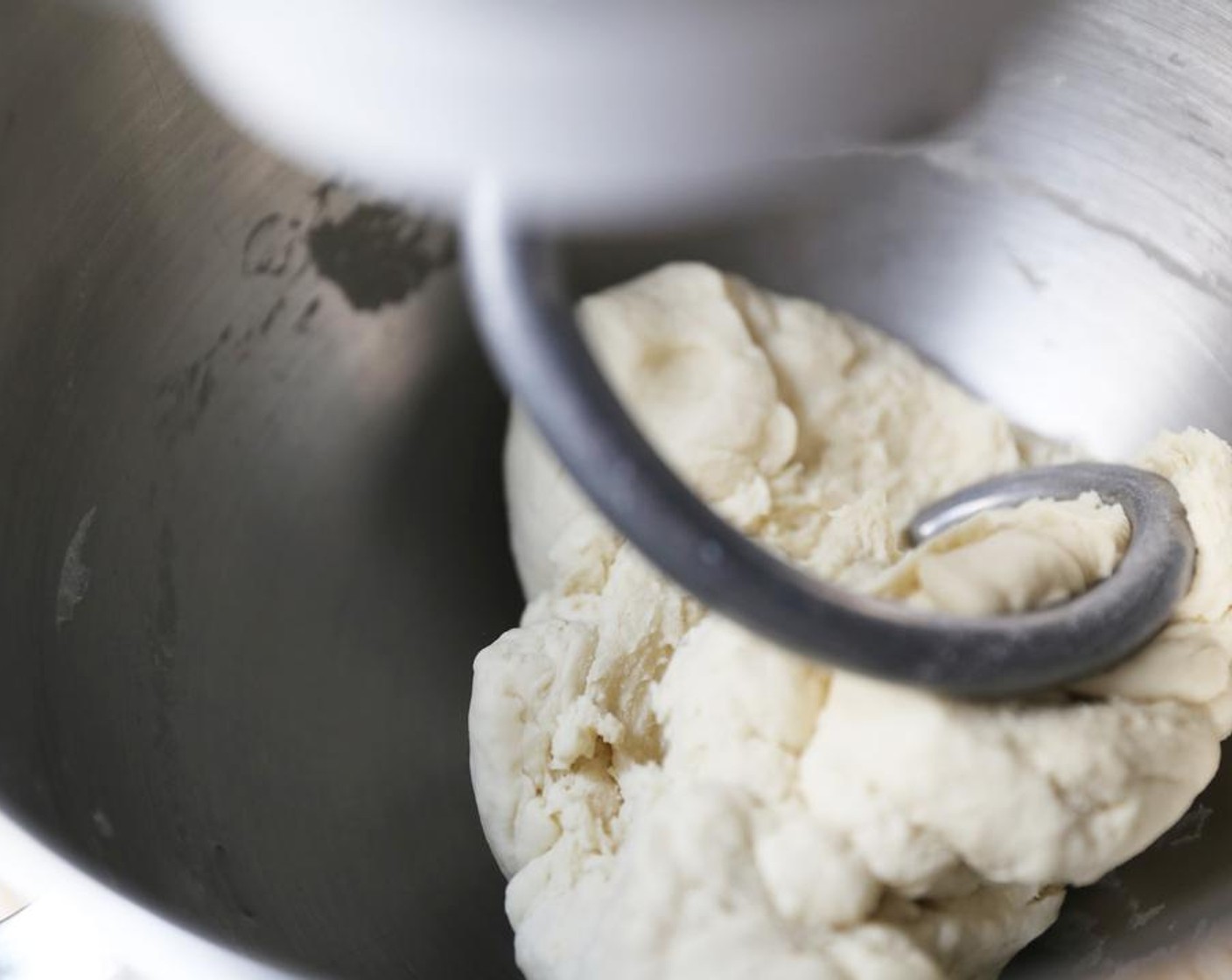 step 4 Knead for around 10 minutes, until the dough is smooth.