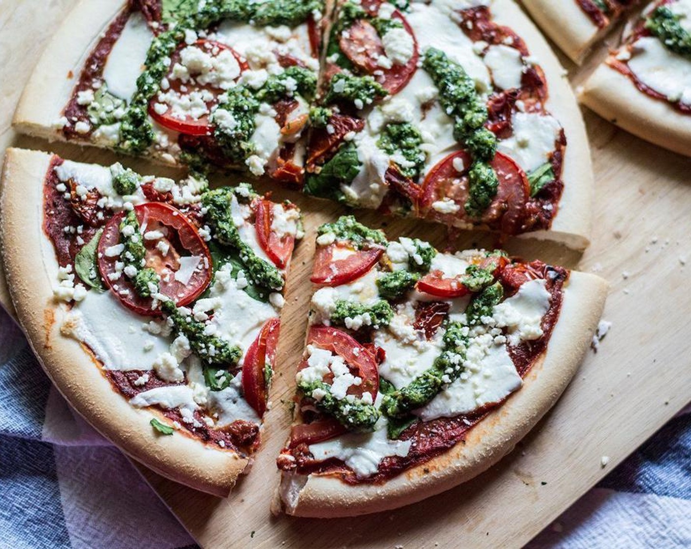 Gluten-Free Three Cheese Sun-Dried Tomato Pizza with Pesto