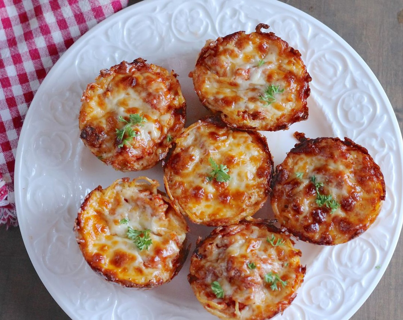 step 13 Bake approximately 30 minutes until cheese is lightly browned. Serve warm.