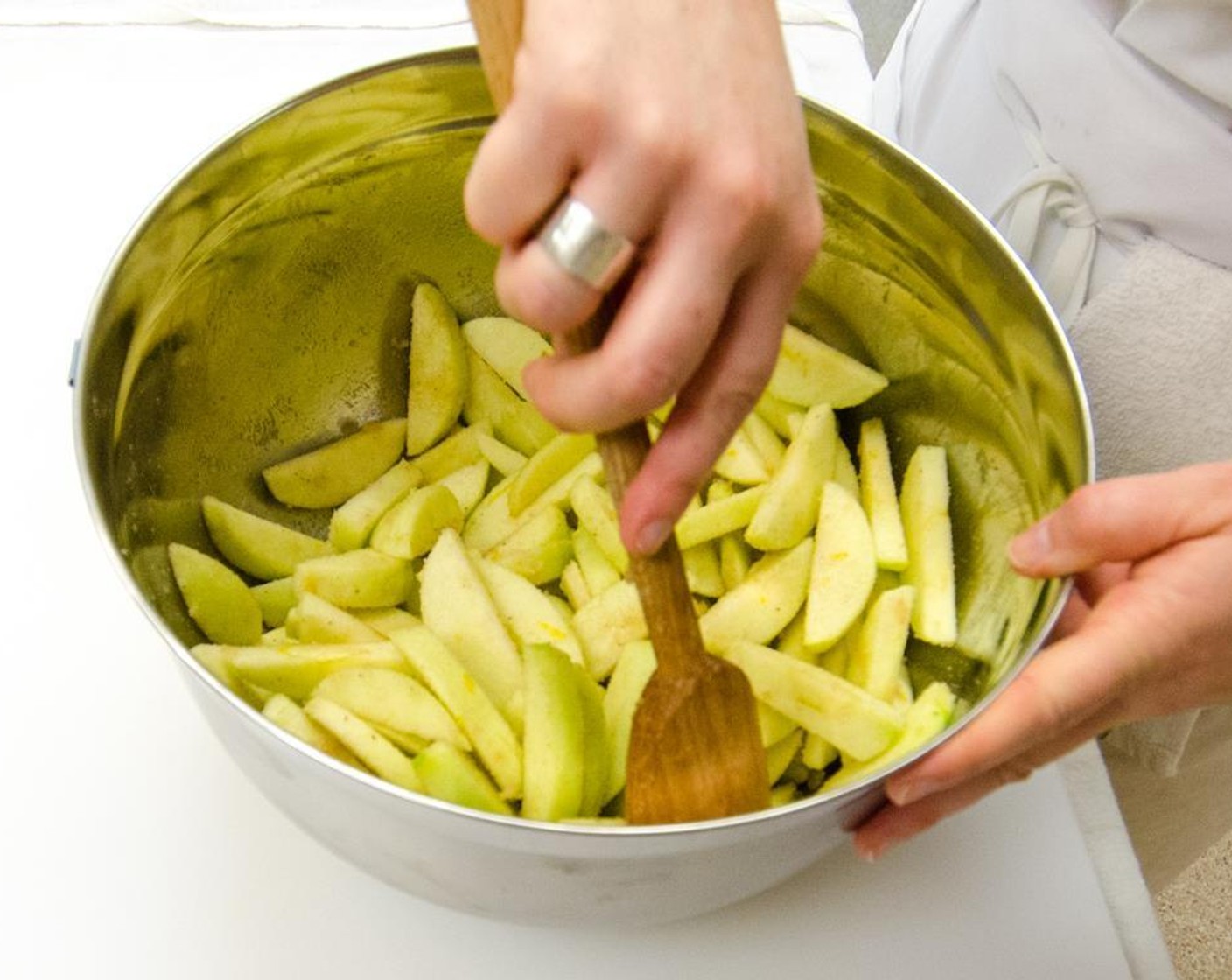 step 13 Add the sugar mixture to the bowl of apples and mix thoroughly.