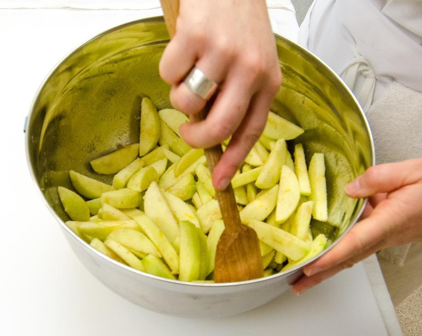 step 13 Add the sugar mixture to the bowl of apples and mix thoroughly.