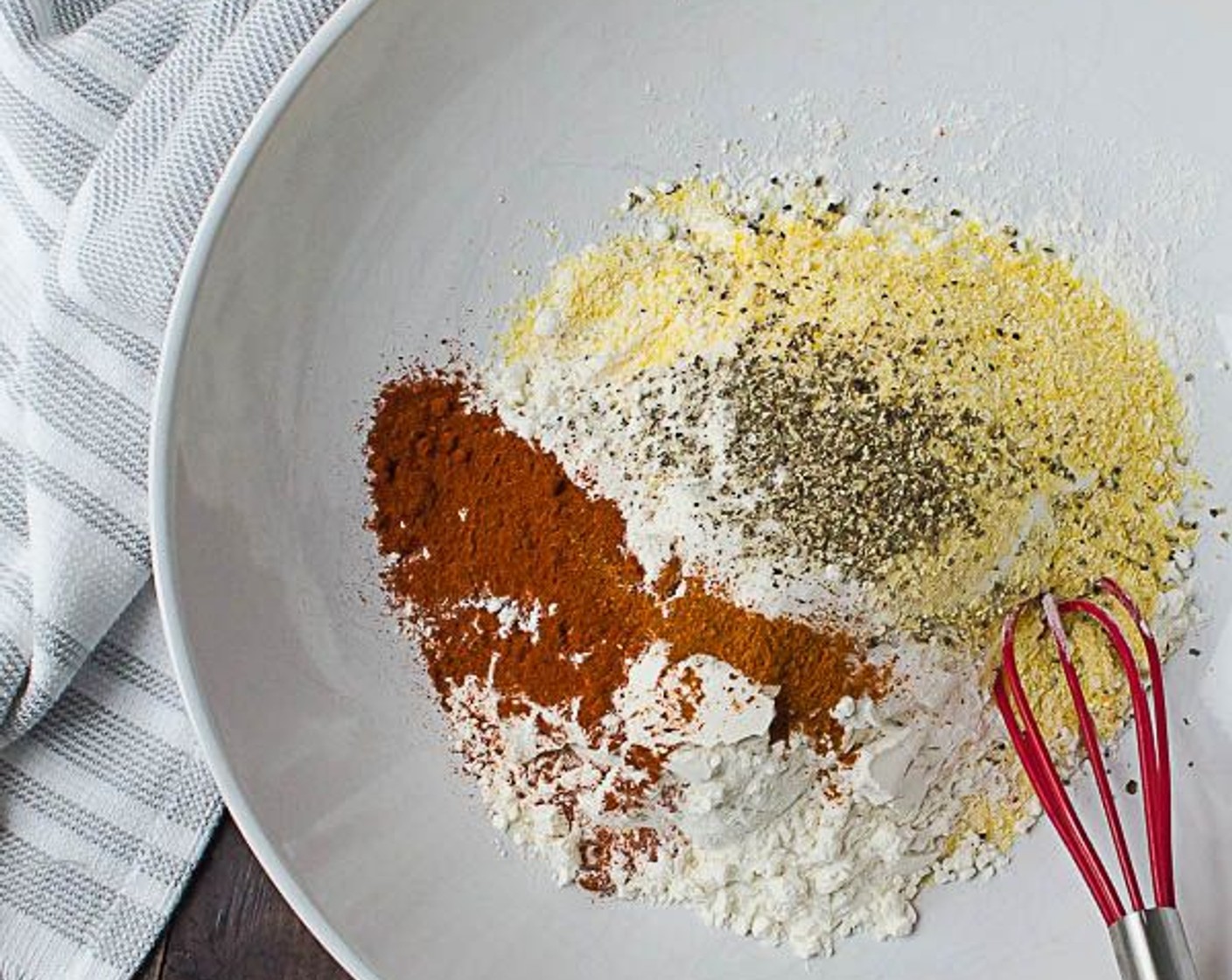 step 5 Set up two shallow bowls for dredging. In one bowl, whisk together the All-Purpose Flour (1 1/4 cups), Cornmeal (1/2 cup), Smoked Paprika (1 tsp), Cayenne Pepper (1/8 tsp), Salt (1/2 tsp), and Ground Black Pepper (1/4 tsp).  Add the Buttermilk (1 cup) to the other bowl.