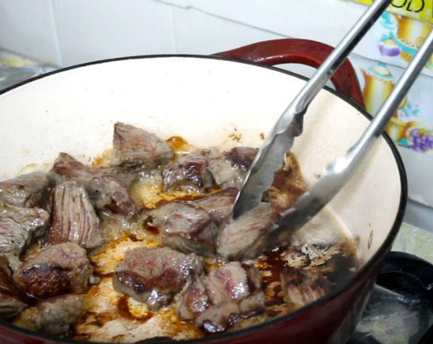 step 2 In a frying pan over high heat, warm the Oil (2 Tbsp). Sear the meat until browned on all sides. Transfer to a bowl and set aside.