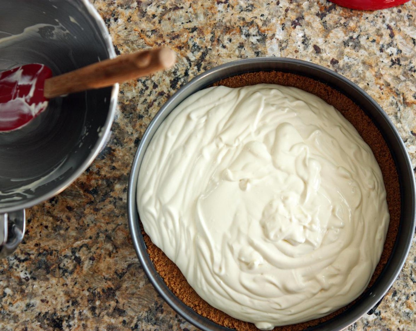 step 9 Pour filling into the crust and spread evenly with a spatula or knife all the way to the edges.