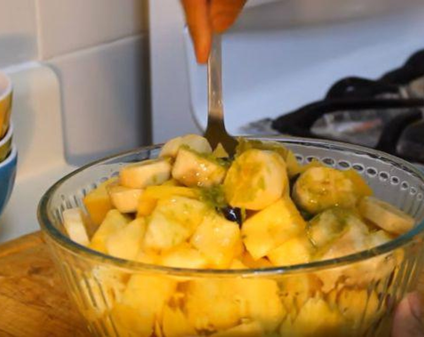 step 2 Zest and juice the Lime (1) and add to the fruit along with the Honey (3 Tbsp). Give it a good mix.