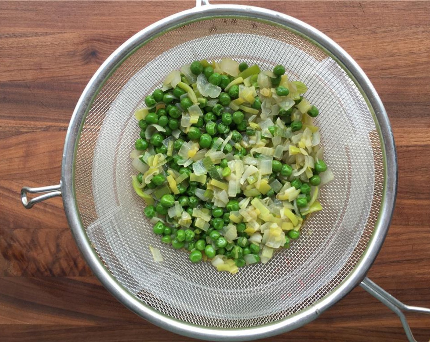 step 7 Strain the pea mixture and save the oil.