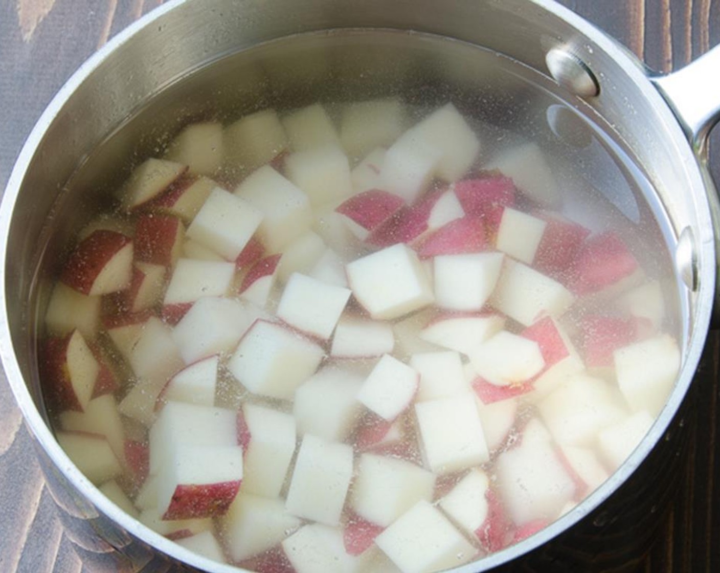 step 6 Add the potatoes to a small pan of water and bring to a boil. Reduce heat to simmer and cook until potatoes are tender, about 7 to 10 minutes. Drain potatoes and set aside to cool.