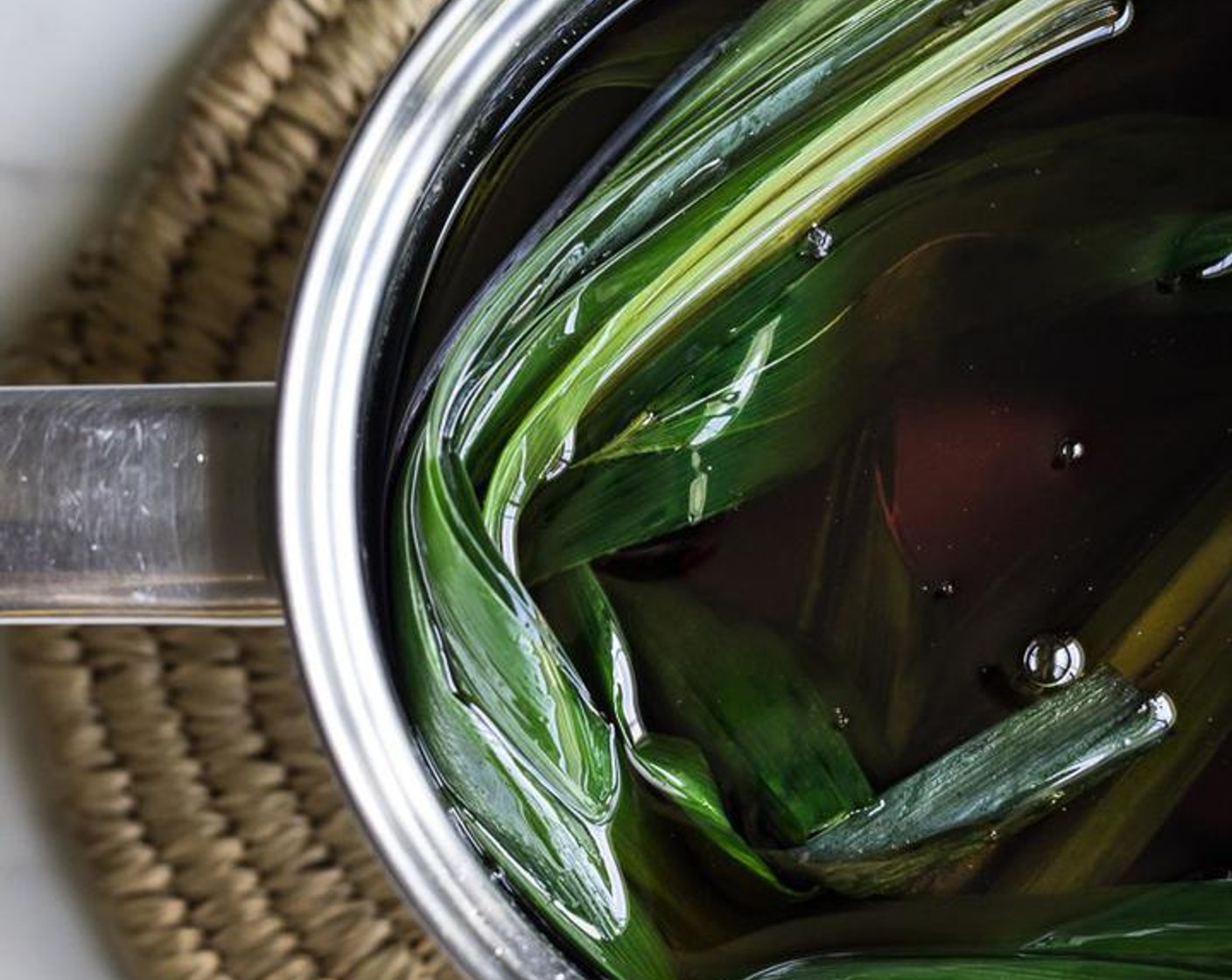 step 2 Add the Pandan Leaves (3), turn the heat to medium and cook the boba for 25 minutes, stirring often.
