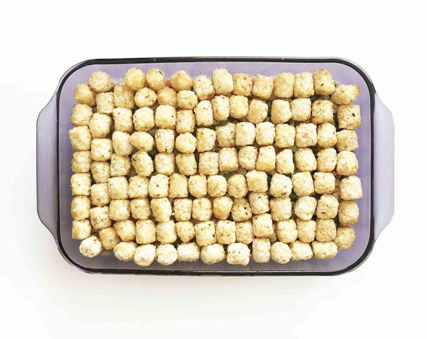 step 5 Cover the mixture with the Frozen Tater Tots (795 g) and set aside.