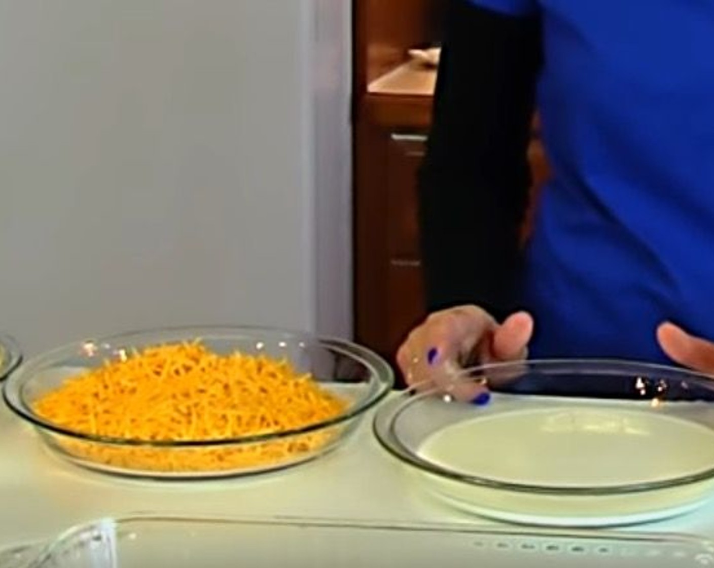 step 2 Pour the Milk (1/2 cup), Shredded Cheddar Cheese (2 cups), and Ritz® Crackers (1 1/2 pckg) into three separate shallow pans or dishes. Stir the Salt (1/4 tsp), Freshly Ground Black Pepper (1/8 tsp), and Dried Parsley (1 tsp) into the Ritz cracker crumbs.