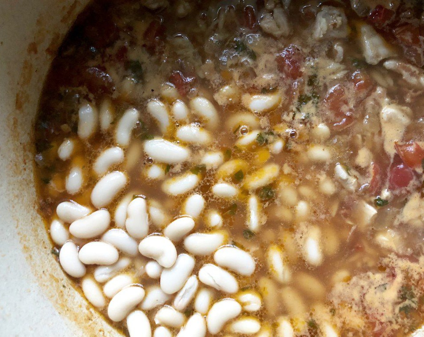 step 7 Add the Cannellini White Kidney Beans (1 can) and simmer for 2 minutes or until heated through. Remove from heat.