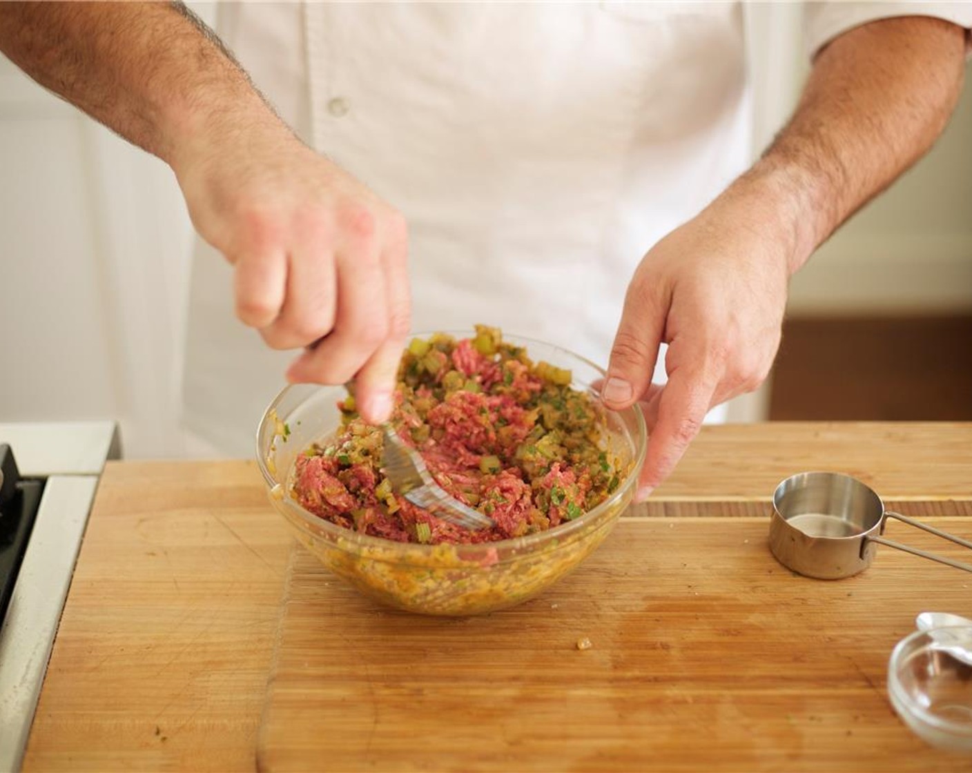 step 5 Add Worcestershire Sauce (2 Tbsp), 1 tablespoon water and Tomato Paste (1 tsp), stir and cool slightly. Add parsley, Egg (1), 1 teaspoon salt, and 1/2 teaspoon pepper to the onion mixture and mix with a fork.