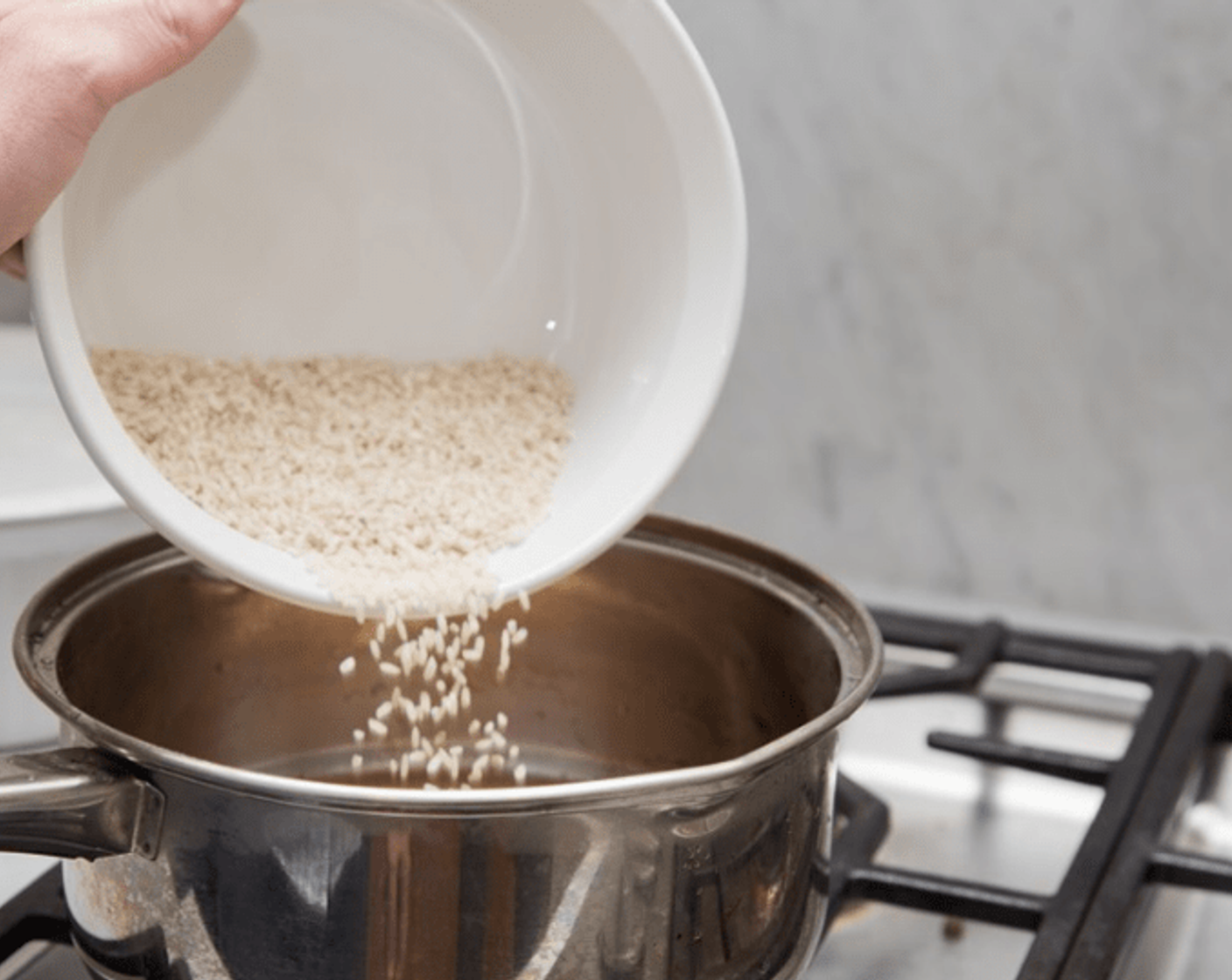 step 2 Remove from heat, and let stand at least 5 minutes. Just before serving fluff Butter (to taste) into rice with a fork. Taste and adjust seasoning as desired.