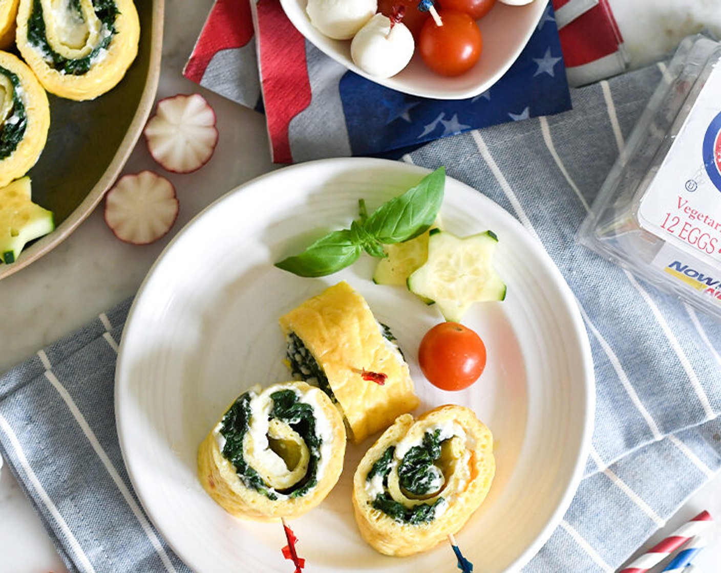step 9 Cut in one-inch slices. You should get about 12 rolls. If you like top with cherry tomatoes and secure with a toothpick. Enjoy!