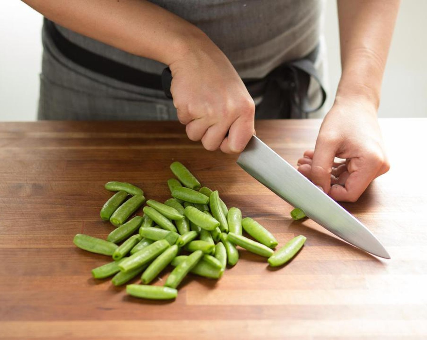 step 2 Trim the ends off the Sugar Snap Peas (2 1/3 cups) and discard; set the snap peas aside.