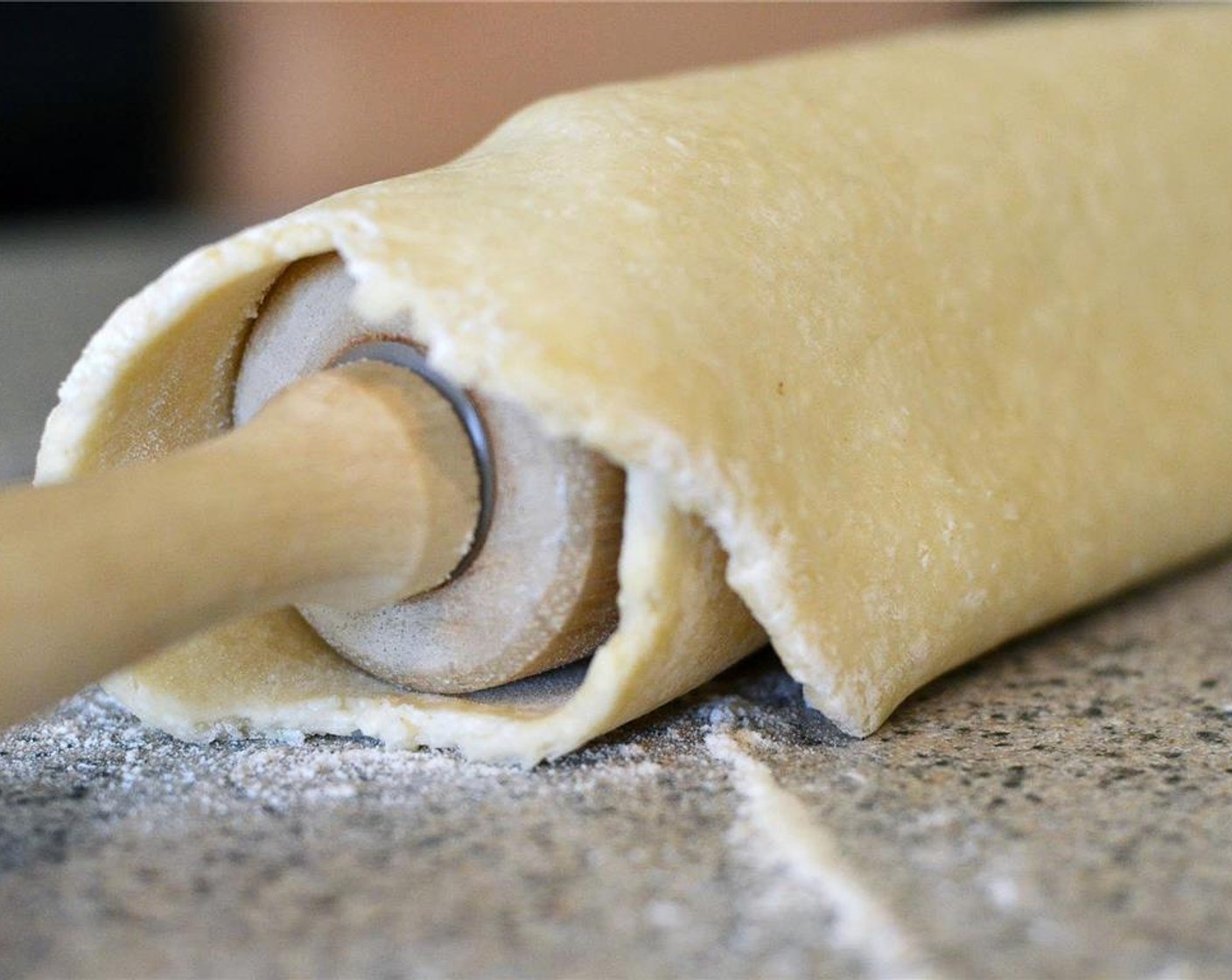 step 5 Preheat oven to 375 degrees F (190 degrees C). On a lightly floured surface, roll dough out into a 13 inch round about 1/8 inch thick. Transfer dough to parchment lined baking sheet and place in fridge until needed.