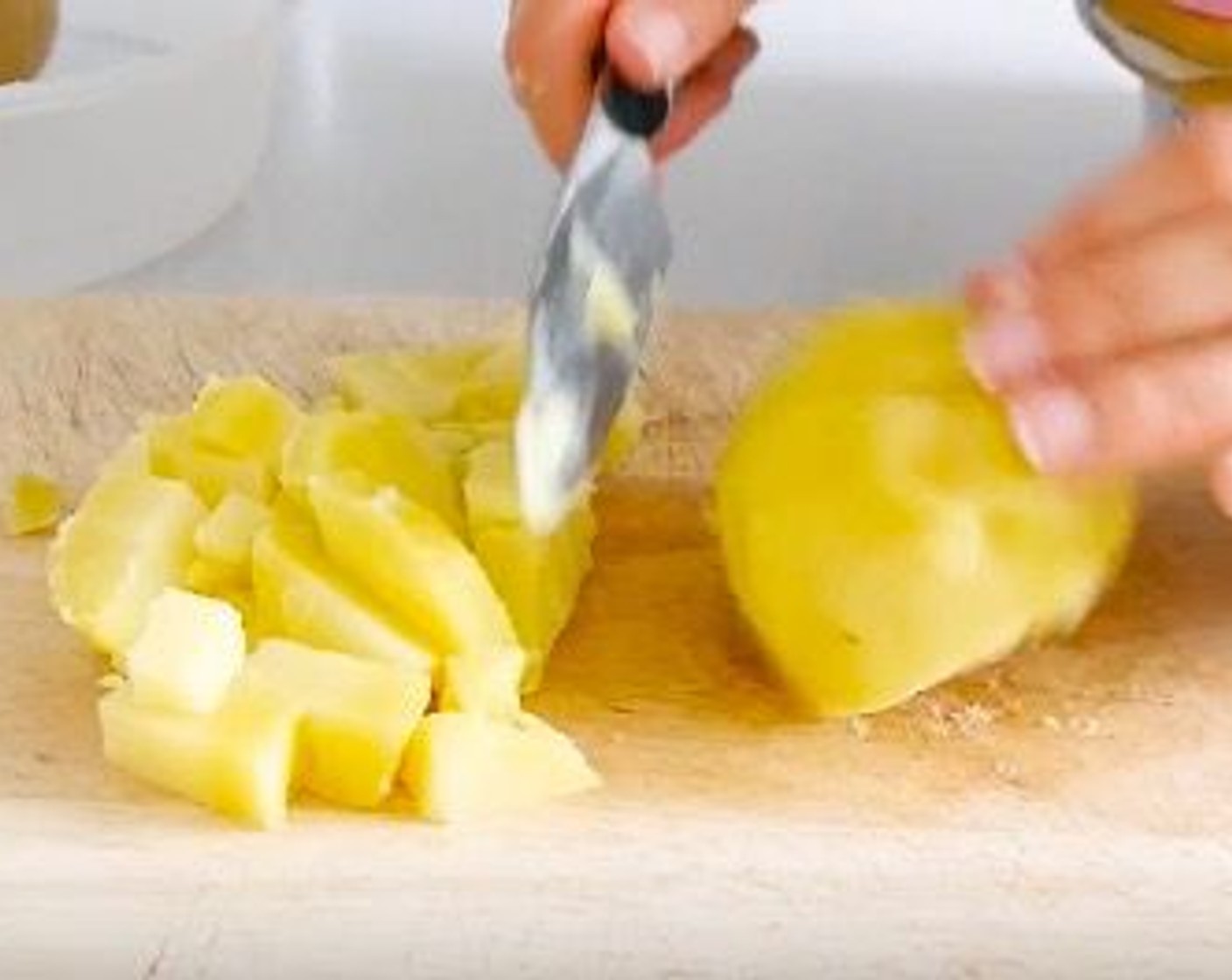 step 7 In the meantime peel and chop the Potatoes (3) which have been previously cooked.