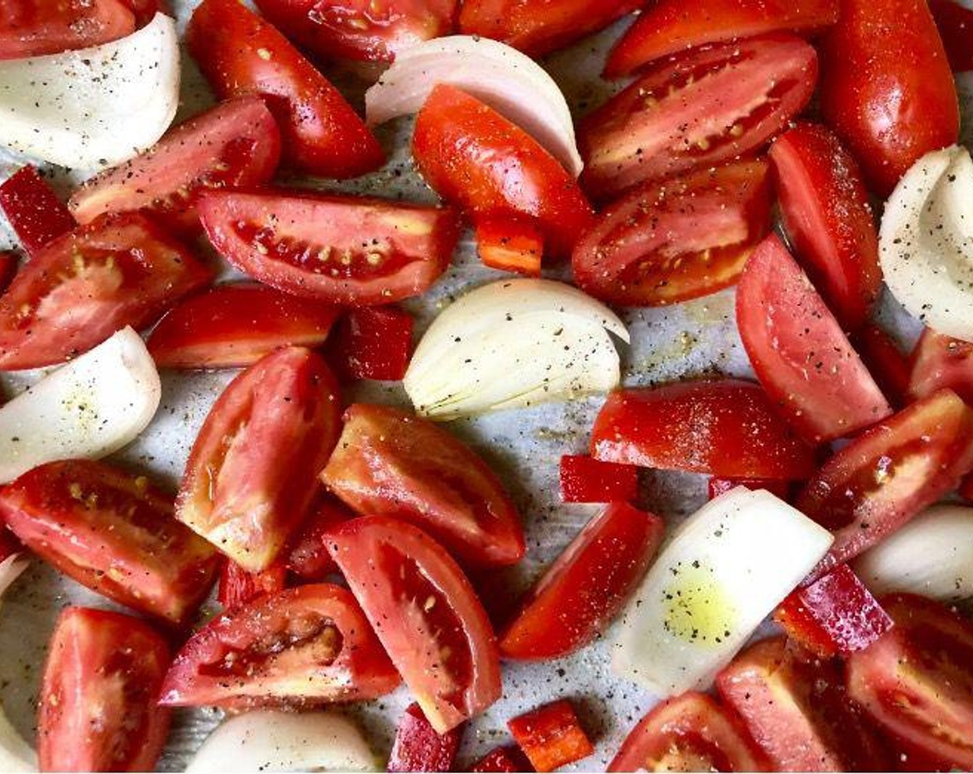 step 3 Drizzle the Olive Oil (3 Tbsp) over the tomato mixture. Season with the Kosher Salt (1/2 Tbsp) and Freshly Ground Black Pepper (1 tsp).