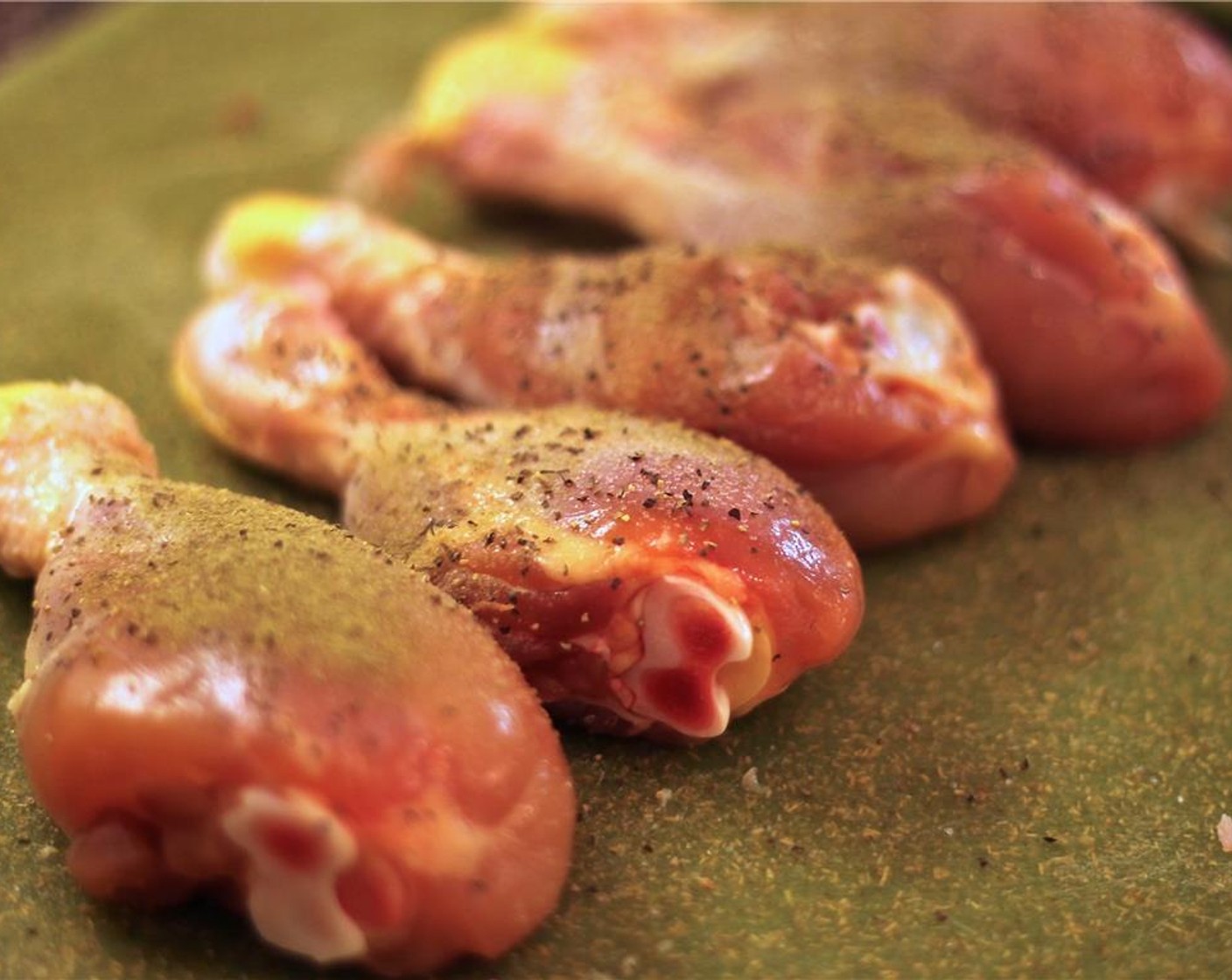 step 3 Season Chicken Drumsticks (5) with Salt (to taste), Ground Black Pepper (to taste), and Fresh Thyme (1 Tbsp).