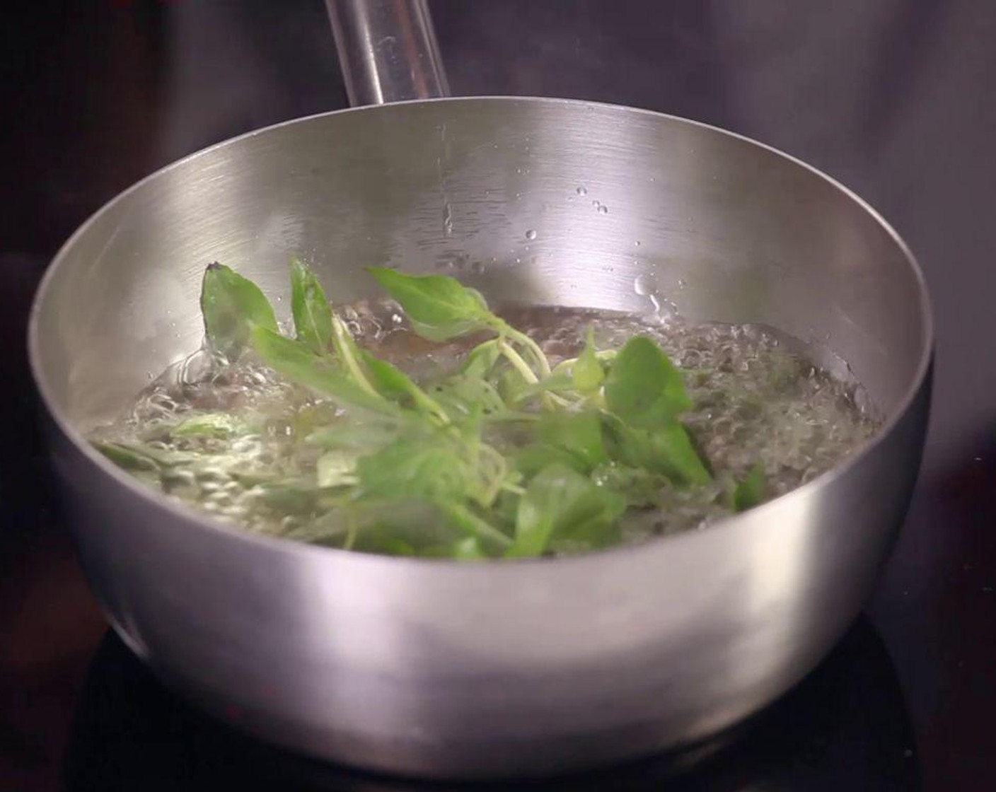 step 1 In a pan, sauté Fresh Basil Leaf (1/2 cup) and Fresh Cilantro (4 sprigs) in Cooking Oil (1 Tbsp) in a pan on high heat.