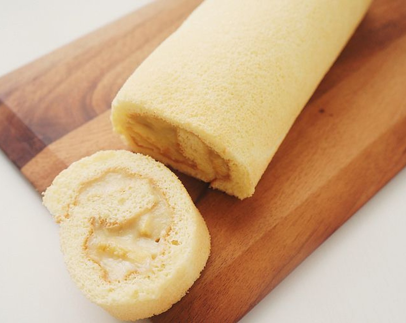 step 21 Cut a slice of the roll cake. Lay it on a dish.