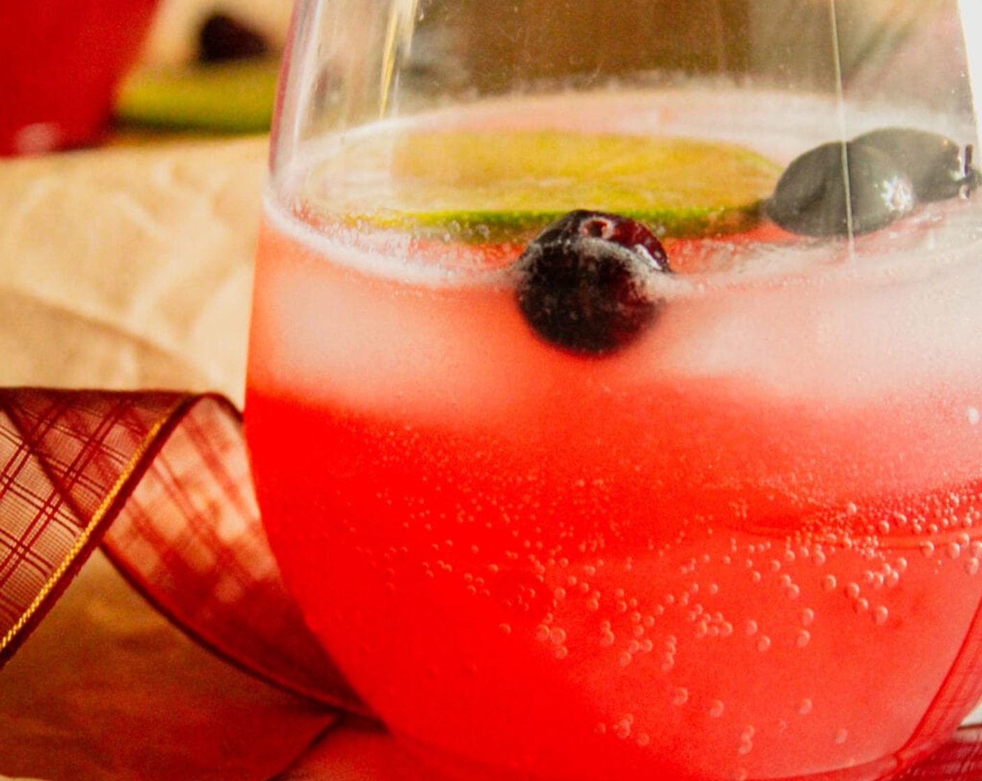 step 4 Garnish with Fresh Cranberries (to taste) and a slice of Lime (1).