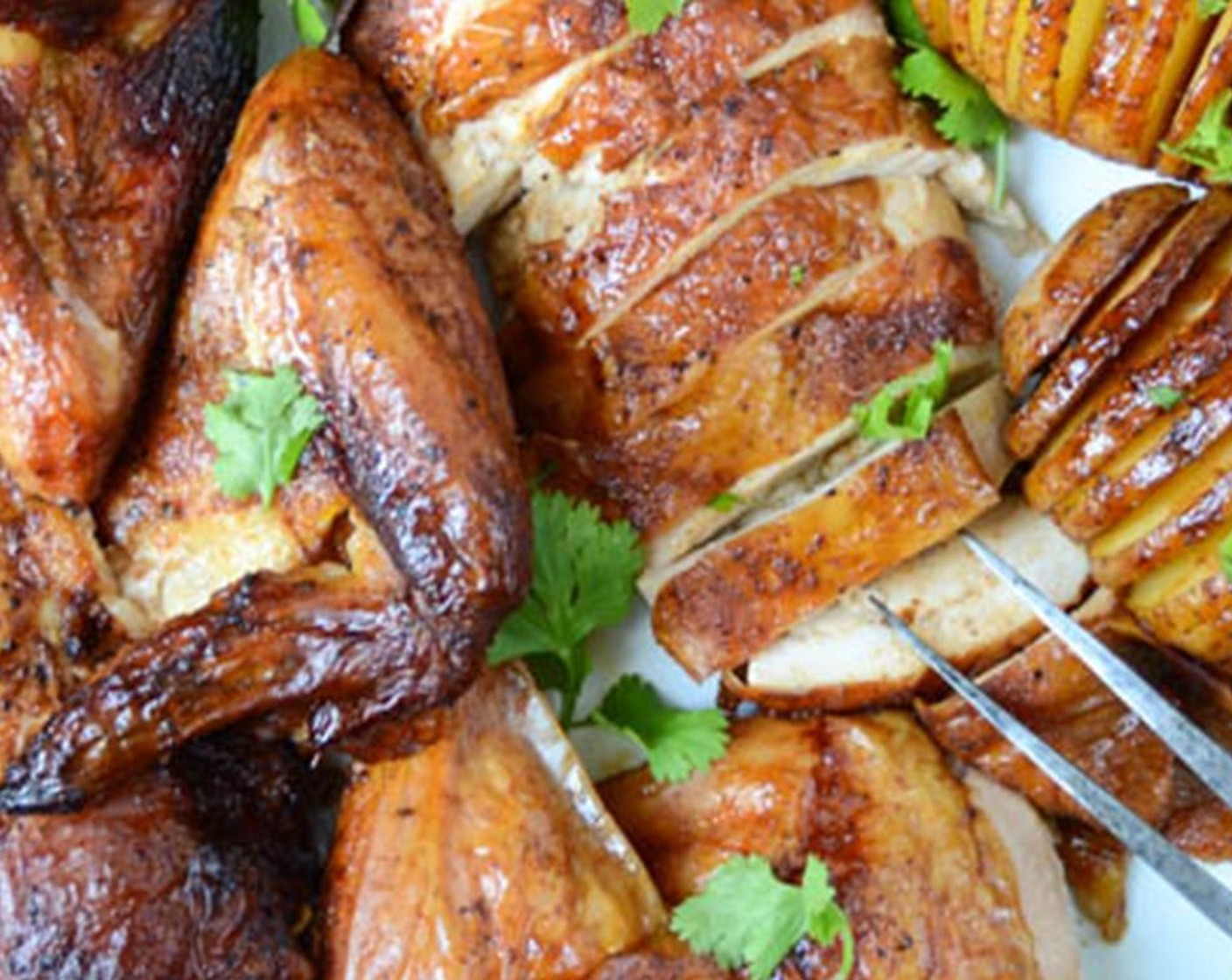 step 16 Carve the chicken and transfer it to a platter. Arrange the potatoes on the platter and sprinkle with Fresh Cilantro (to taste). Serve.