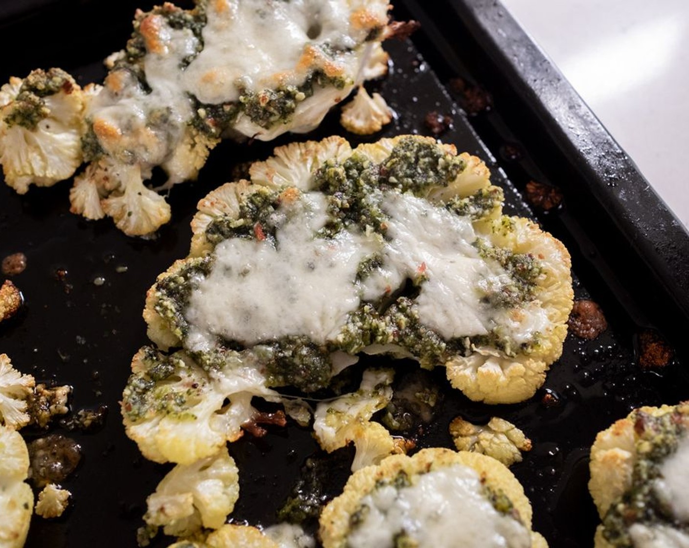 Cheesy Cauliflower Steaks with Homemade Pesto