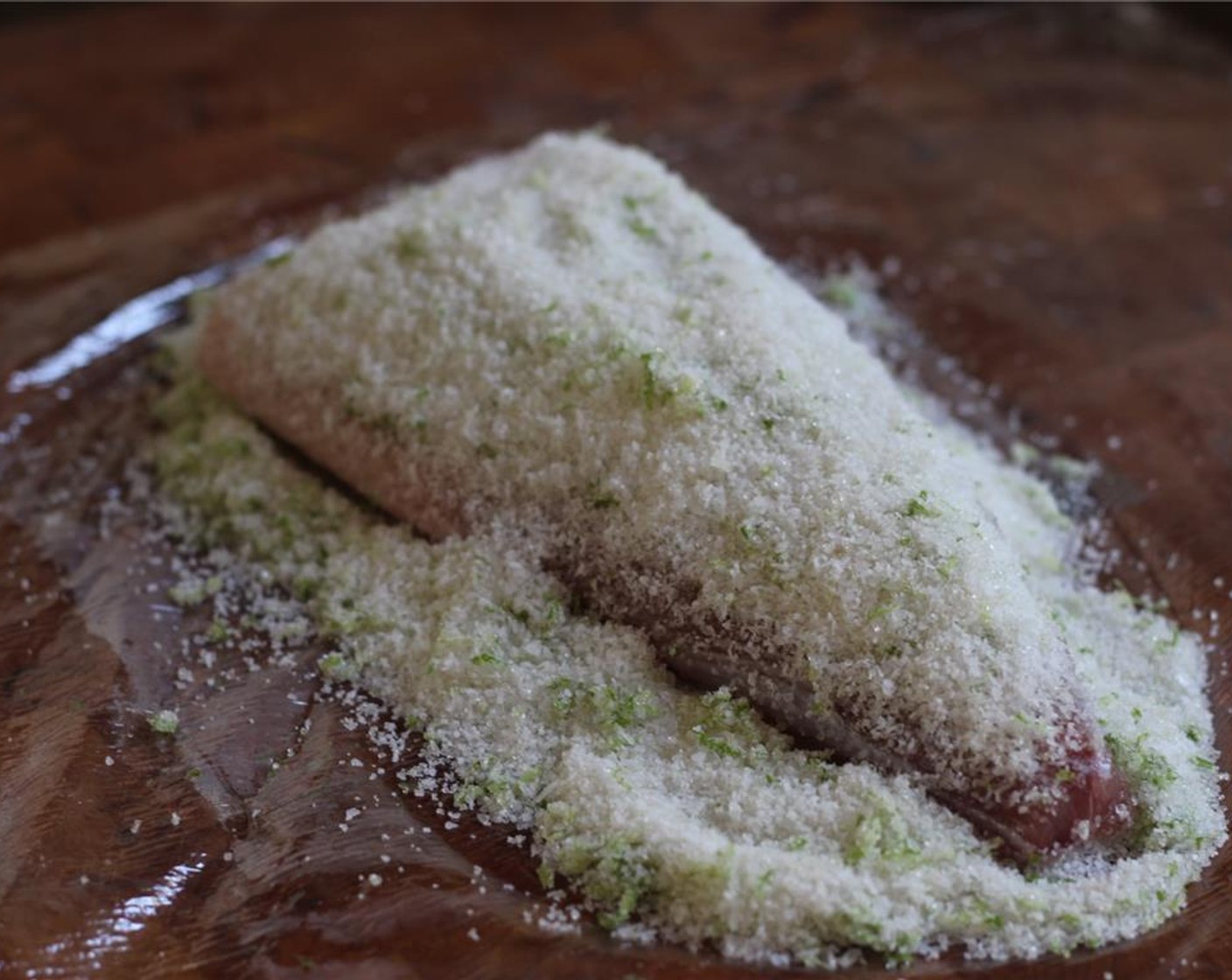 step 5 Place each of the Hamachi Fillets (2) on top and cover with the remaining salt mixture.