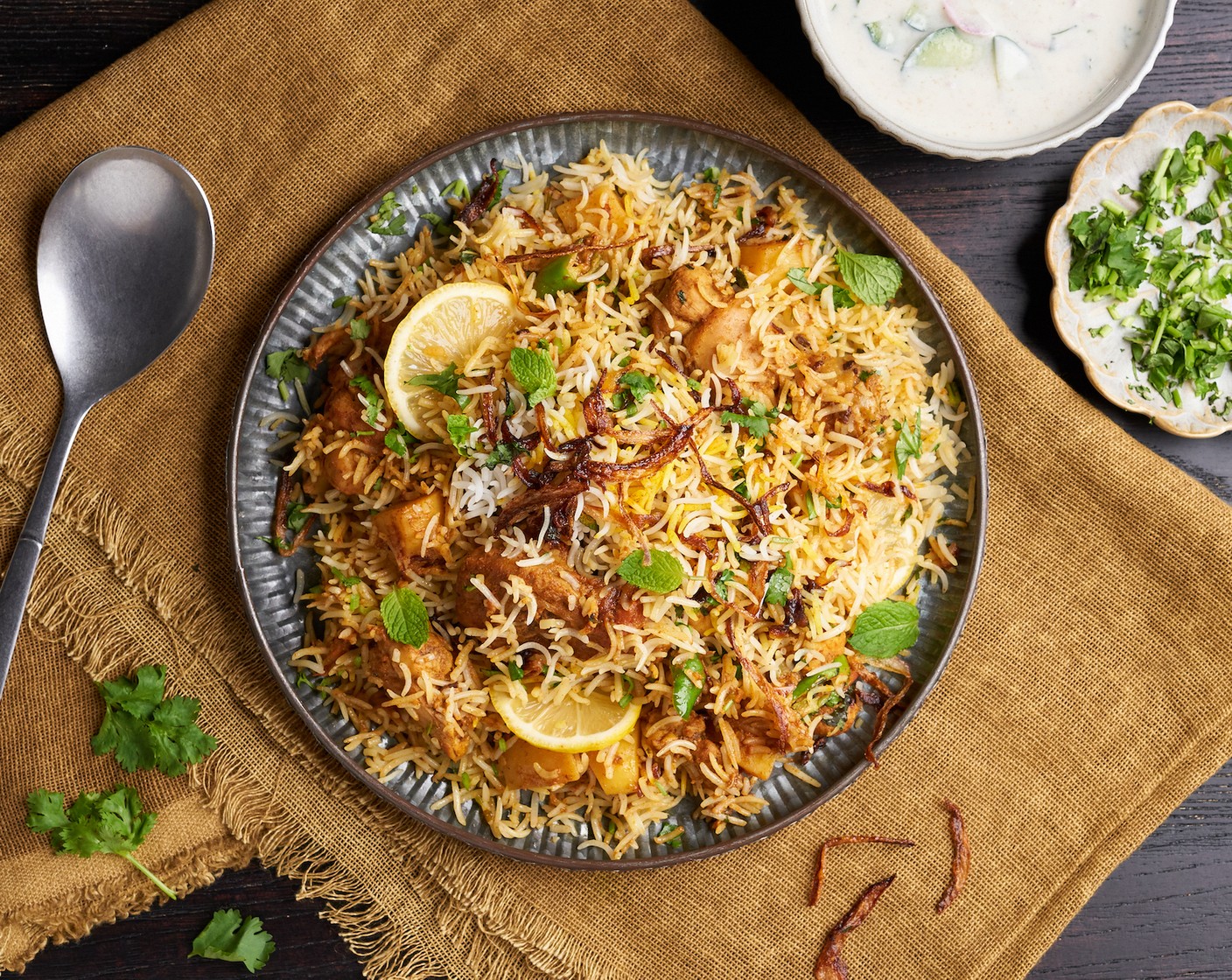 step 14 Serve the rice on a platter. Garnish with cilantro, mint, and optionally serve with Raita (1 cup)